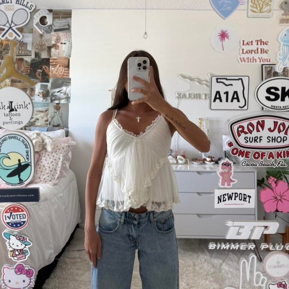 white flowy free people lace top